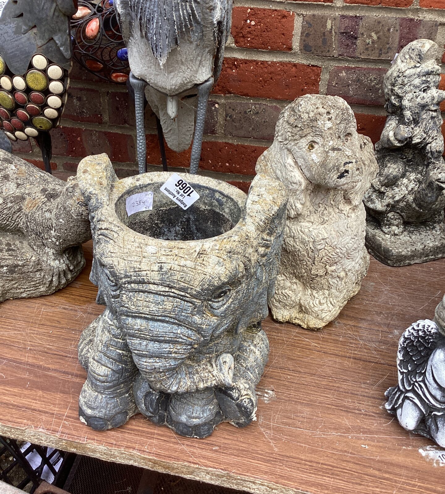 Elephant and poddle garden ornaments