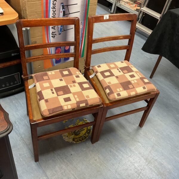 Pair of vintage ladder back chairs