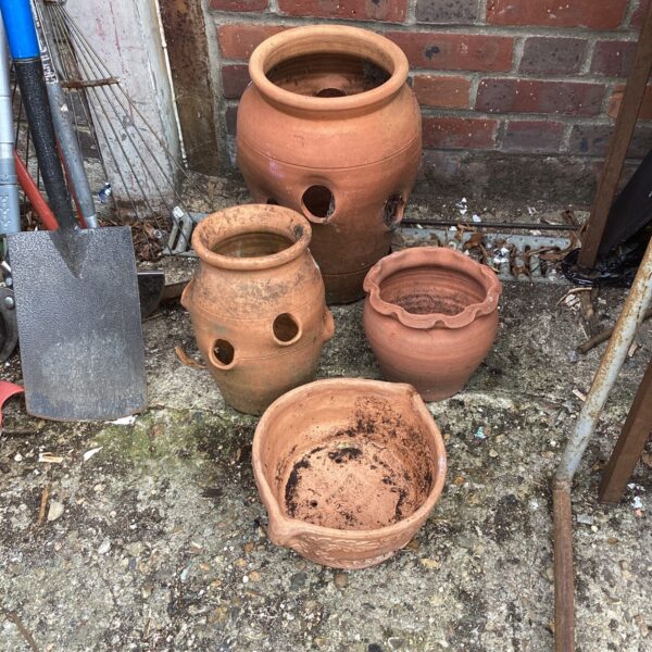 Four terracotta garden pots