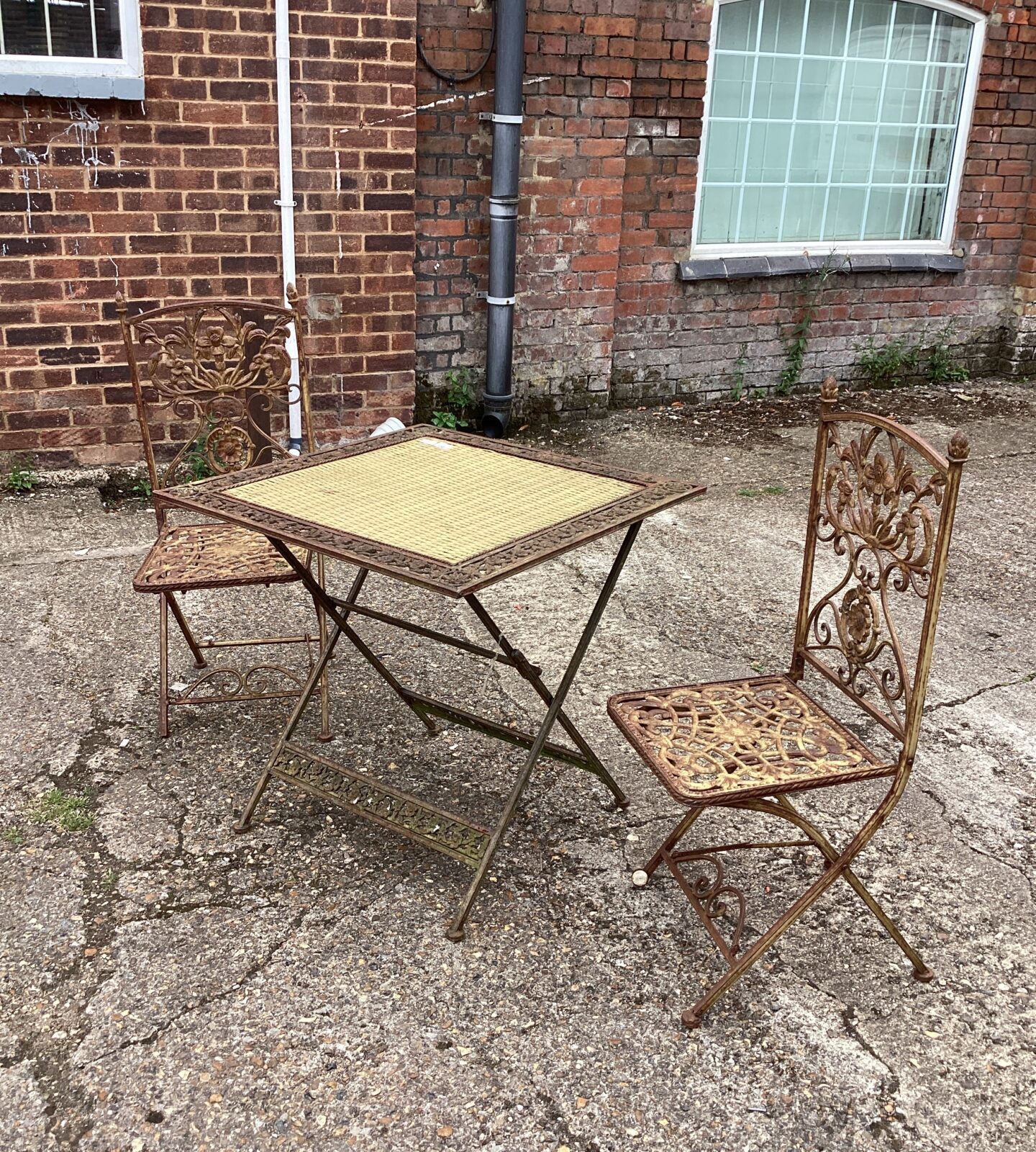 Ornate Metal Folding Garden Table and Two Chairs