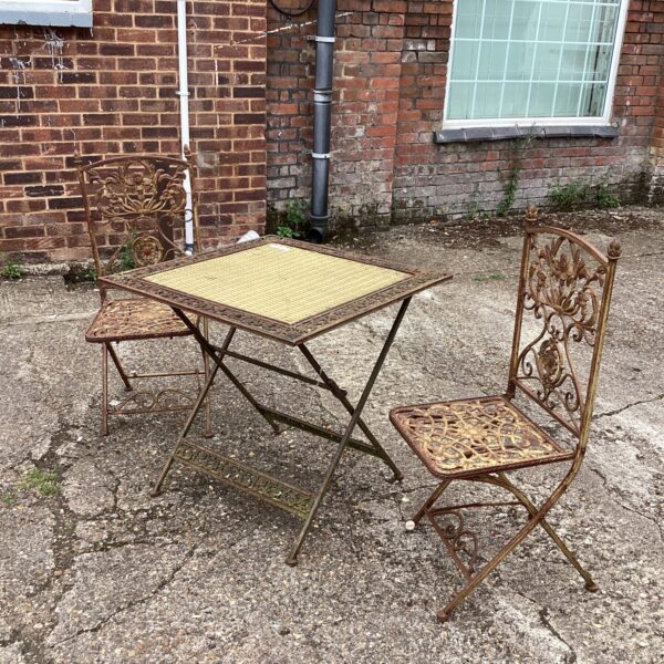 Ornate Metal Folding Garden Table and Two Chairs