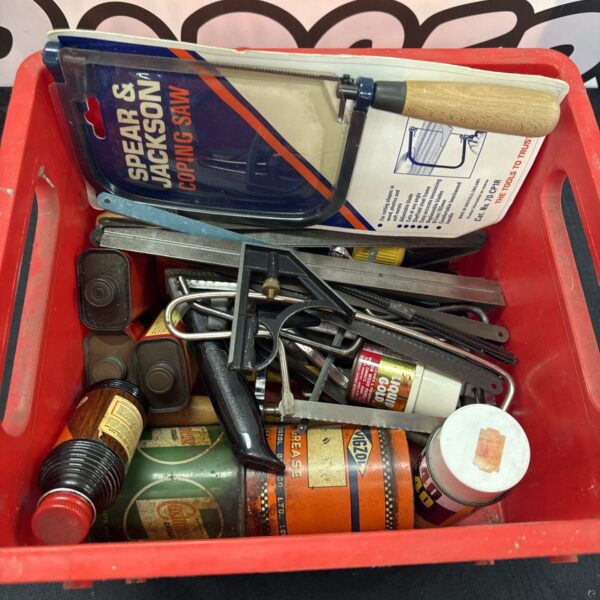 Box of mixed items inc vintage grease tins & new spear & Jackson coping saw