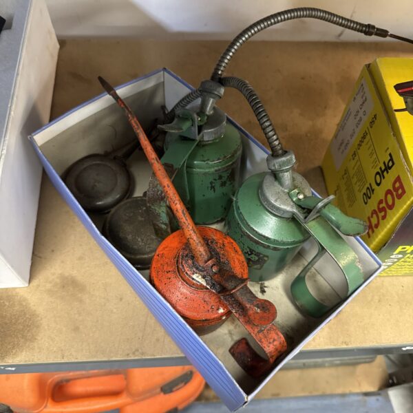 Selection of vintage oil drip cans