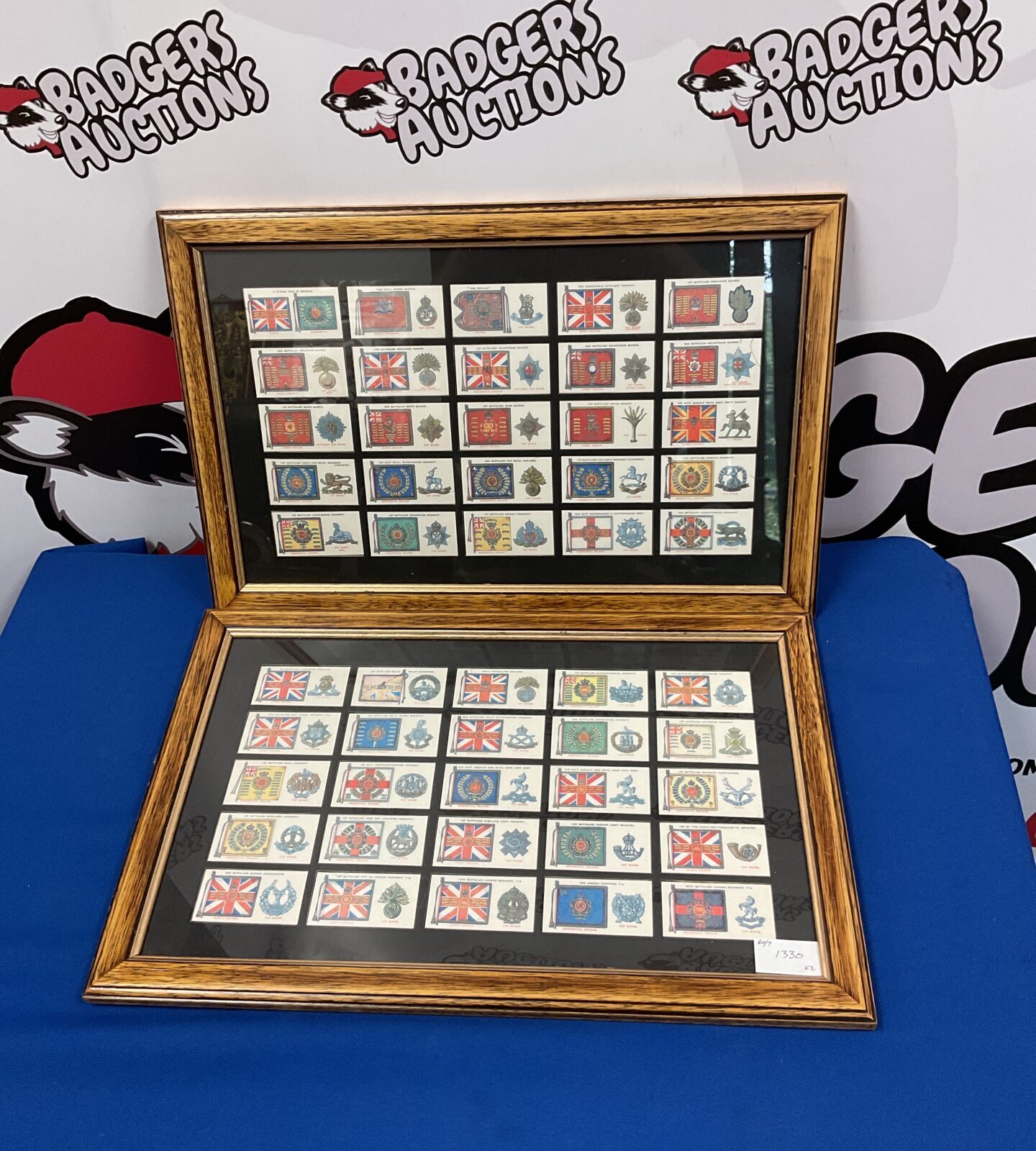 Two framed sets of military badge cigarette cards