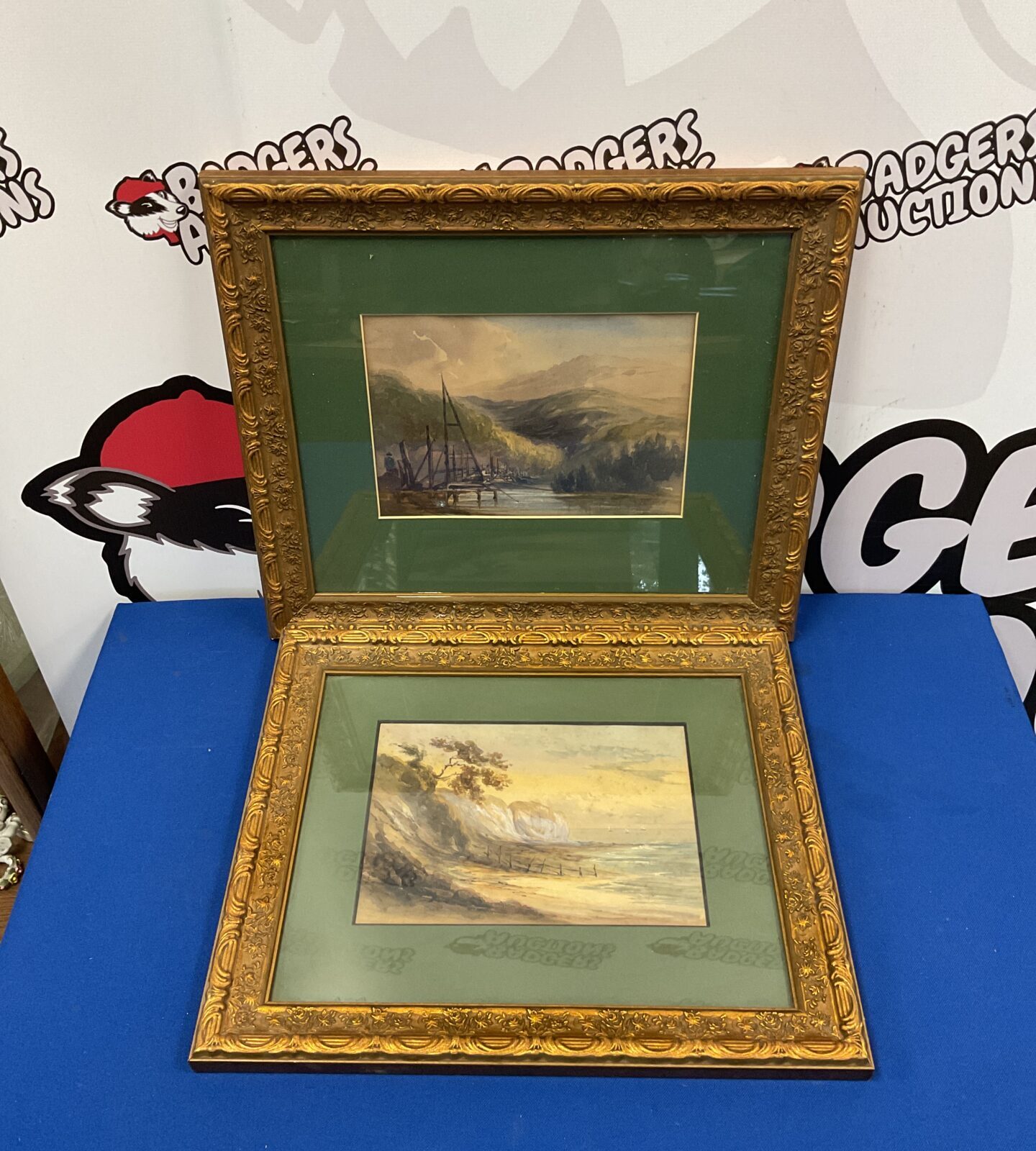 Pair of antique gilt framed landscape watercolours