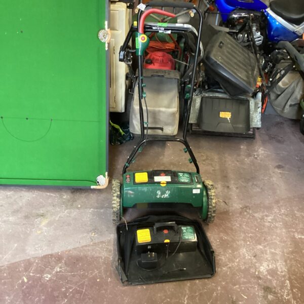 Battery operated lawn mower with spare battery and charger tested and working