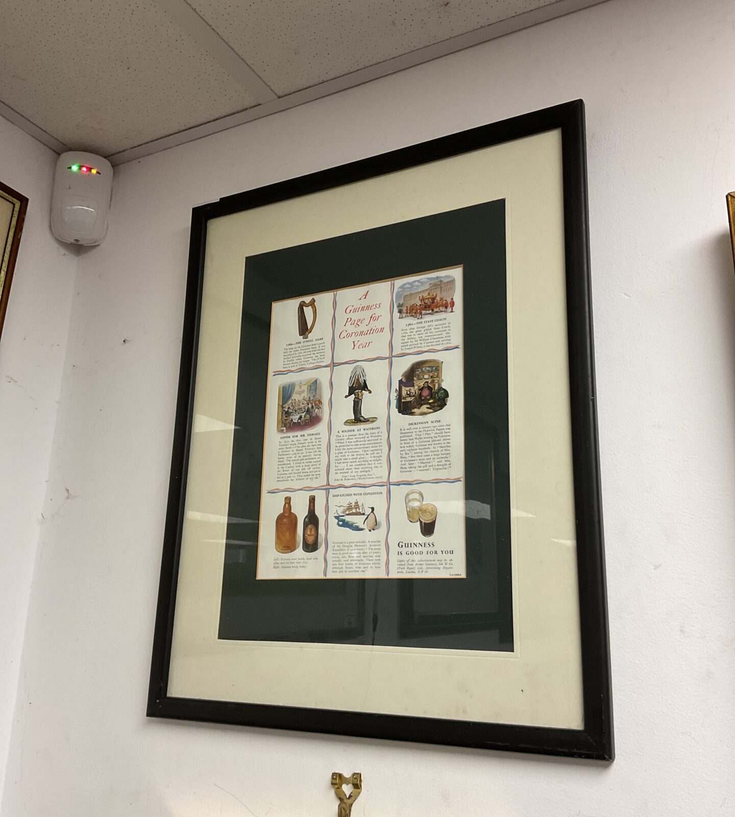 Framed Guinness coronation year advertising print