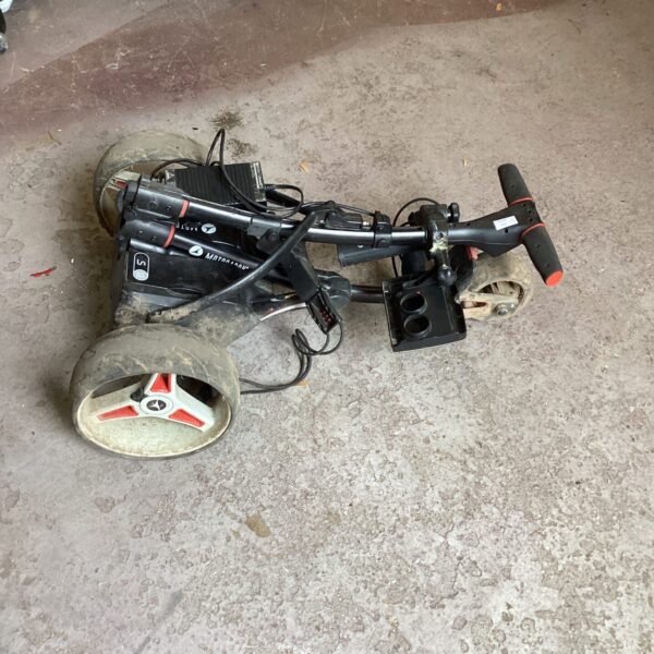 Golf Motocaddy with charger in need of repair
