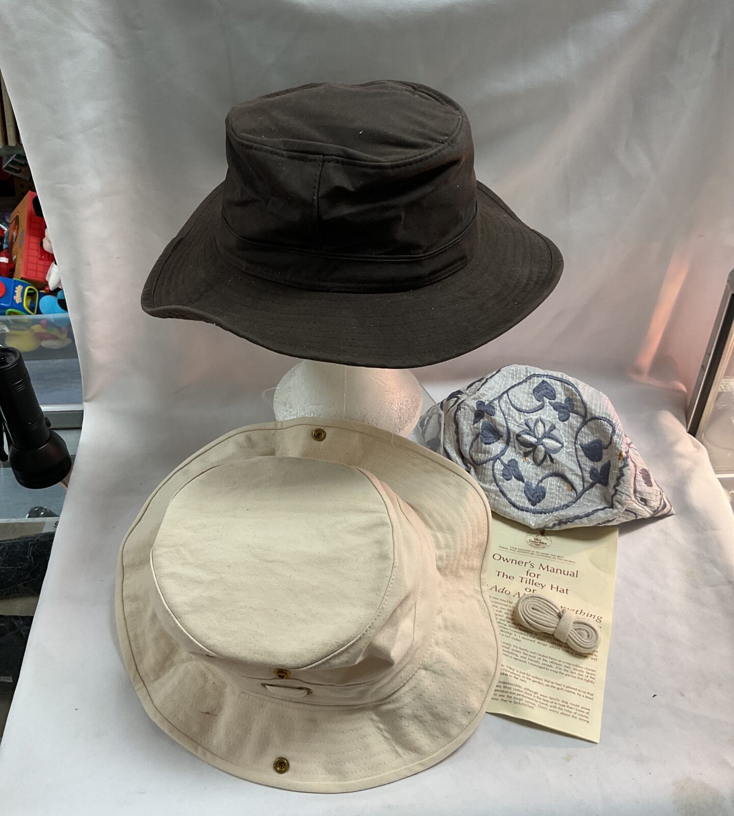 Three hats inc the Tilley hat And Barbour style hat and other