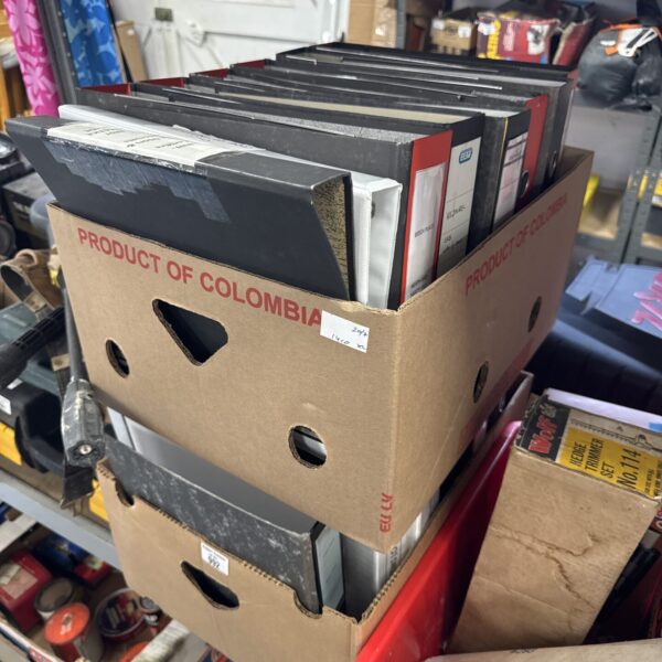 Two boxes of assorted ring binders