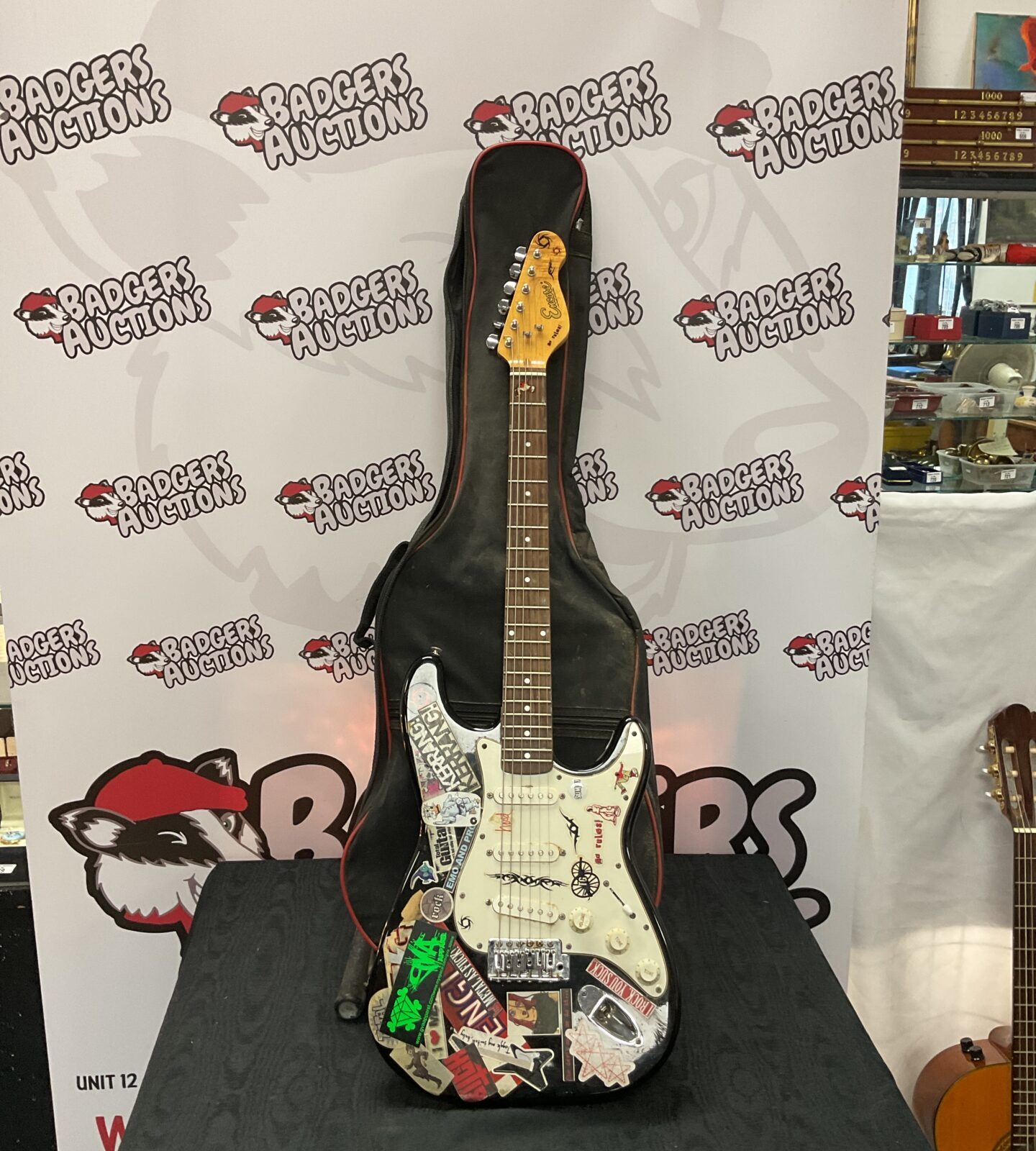 Black encore electric guitar with case