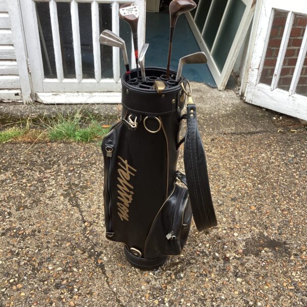 Vintage leathrr golf bag with clubs