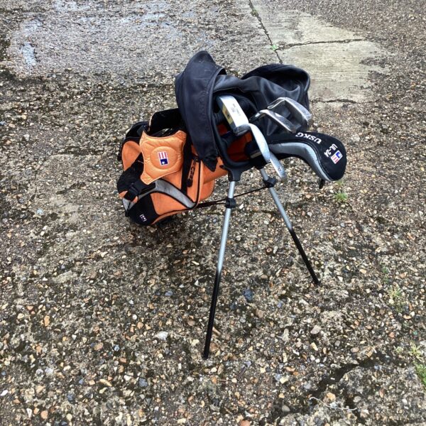 Set of childs golf clubs with bag