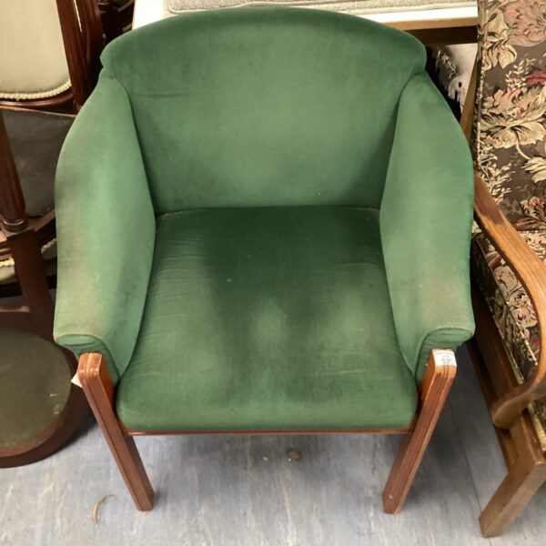 green fabric tub chair