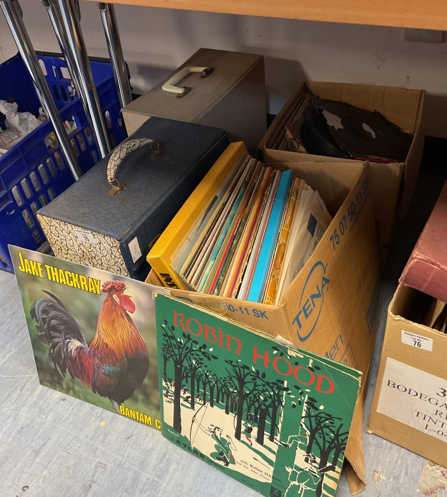 Four boxes of 12” vinyl records
