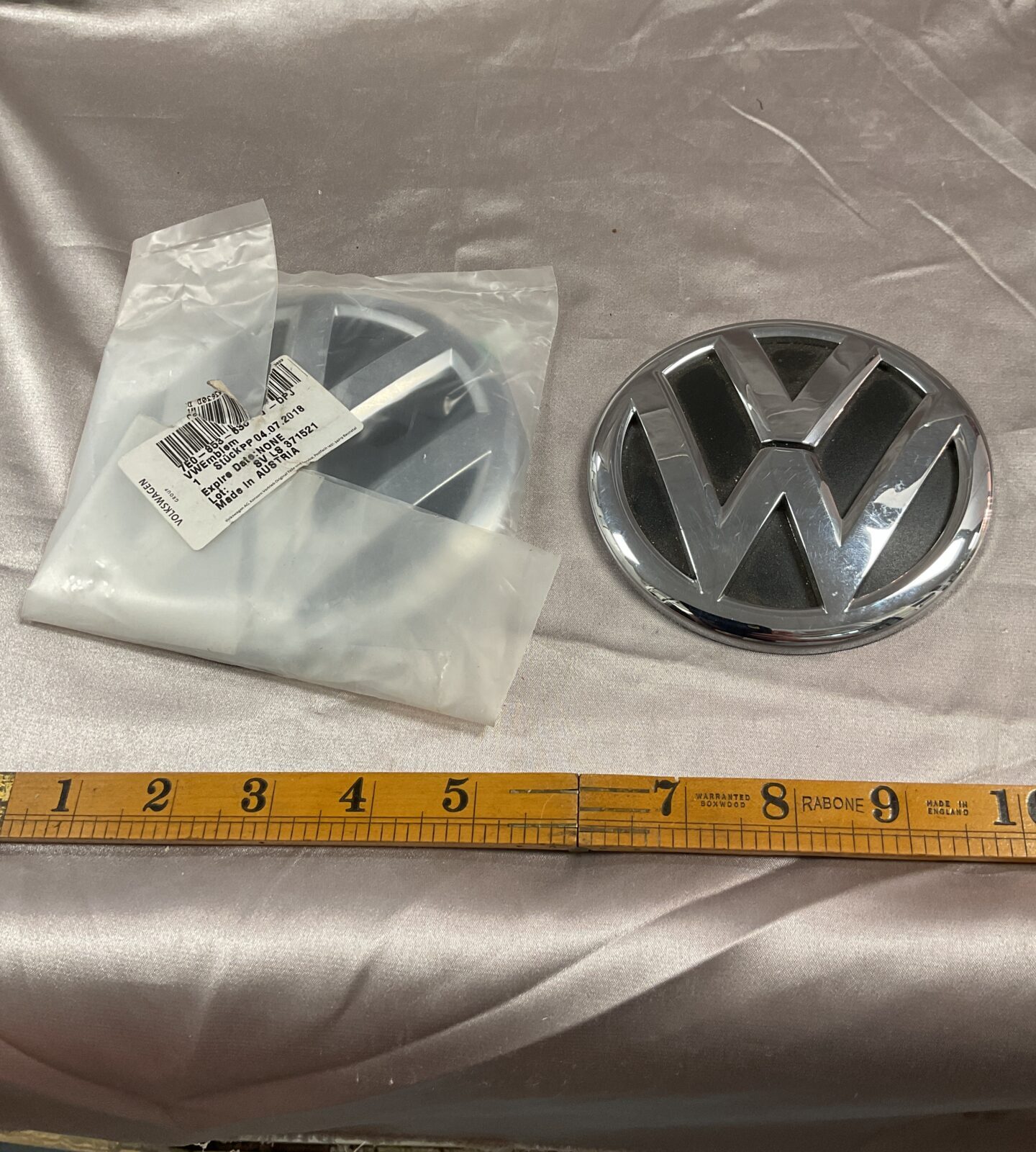 Two V W Van badges