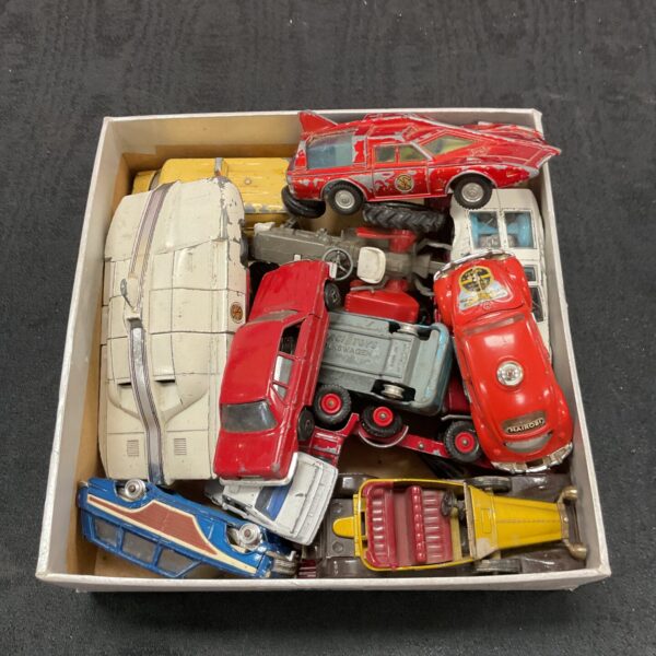 Box of vintage diecast vehicles including dinky spectrum cars