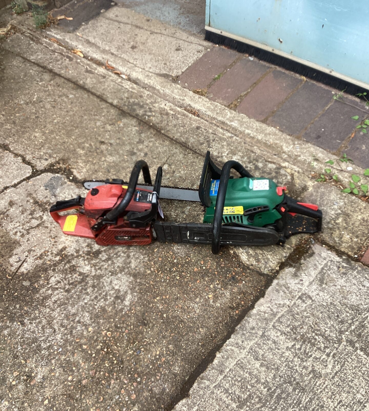 Two petrol chainsaws for repair