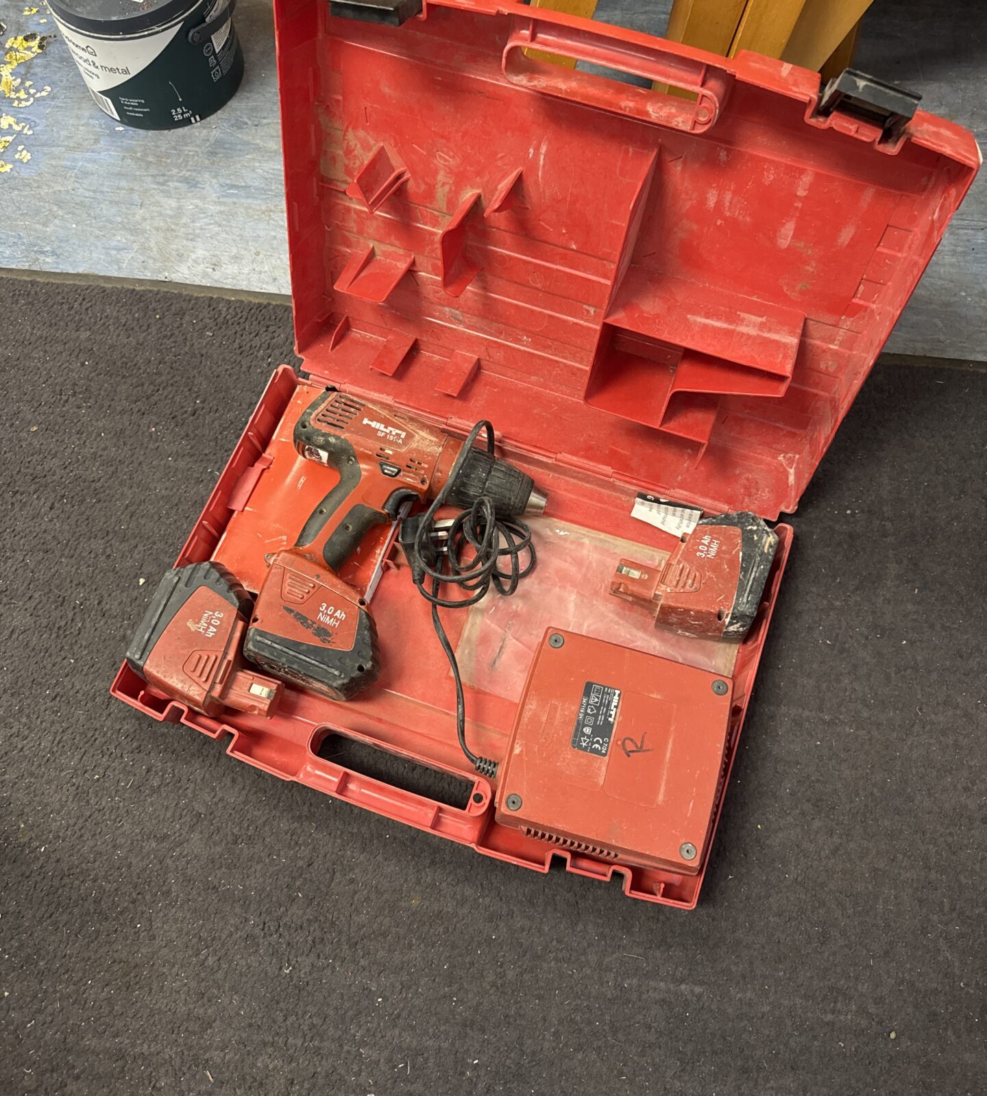 Hilti cordless drill with batteries & charger - powers on