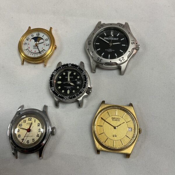 Lot of five vintage wristwatches, including Seiko timepieces.