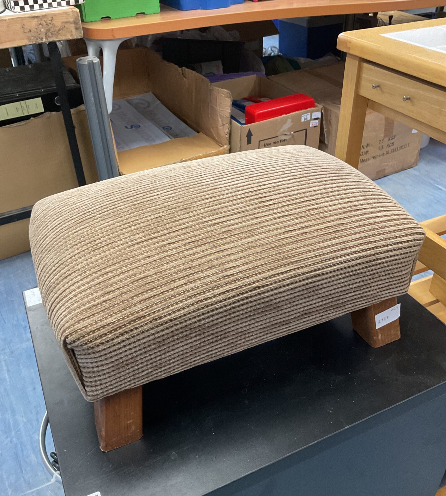 Brown corduroy fabric covered footstool