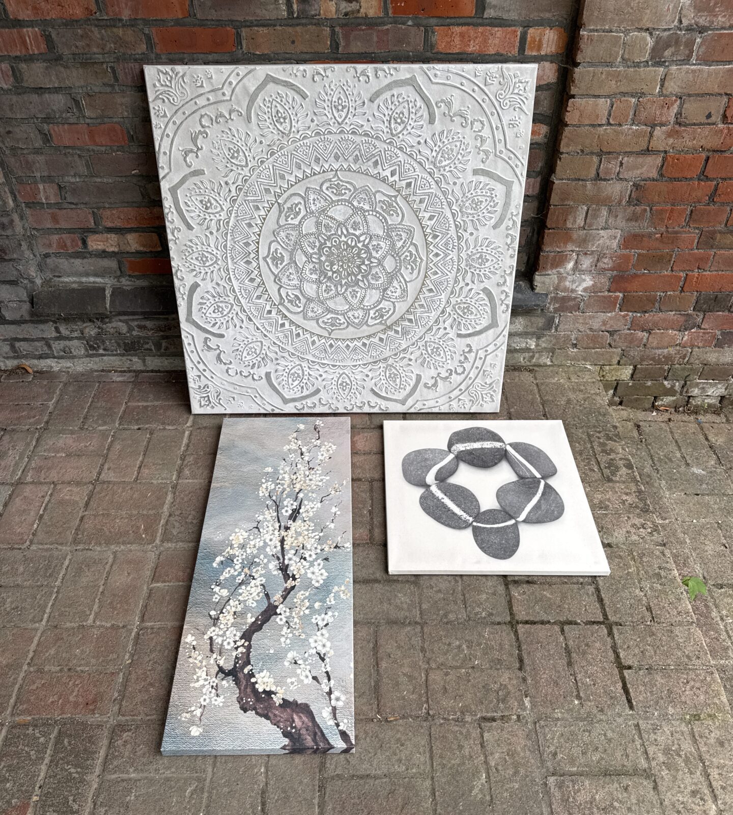 Three prints on canvas - one is very large