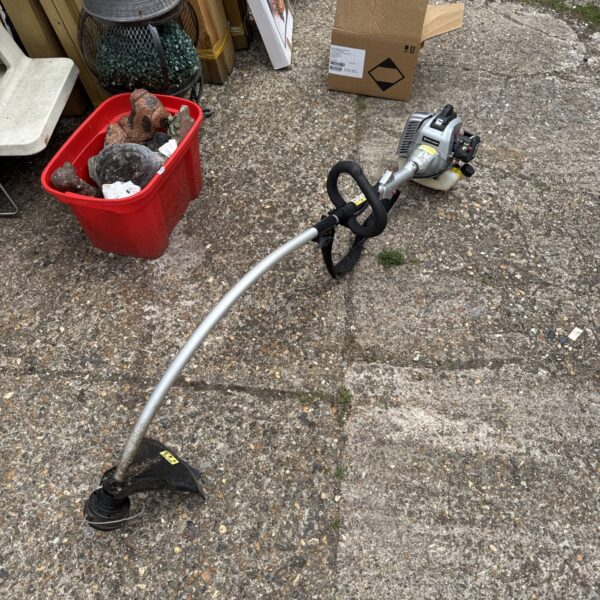 Spear & Jackson petrol strimmer - has compression, untested further