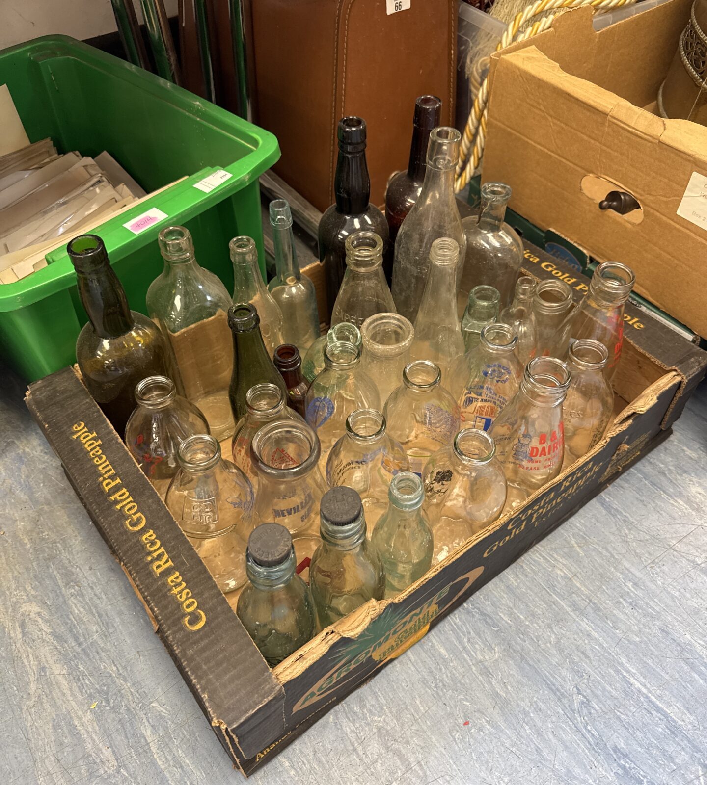 Box of assorted glass bottles inc vintage & milk advertisement