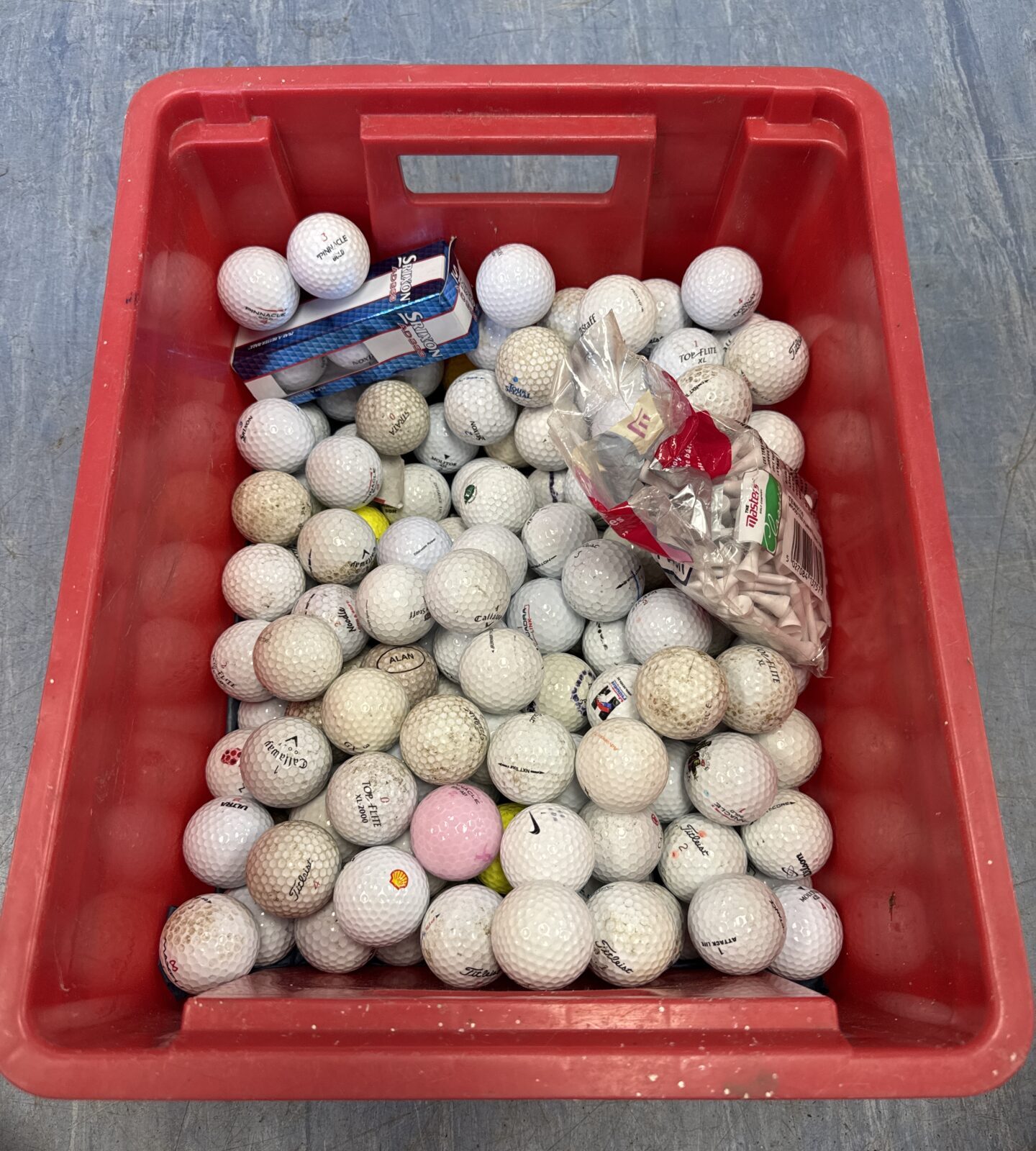Box of assorted loose golf balls with new three pack of Srixon AD333 balls & opened packet of tees