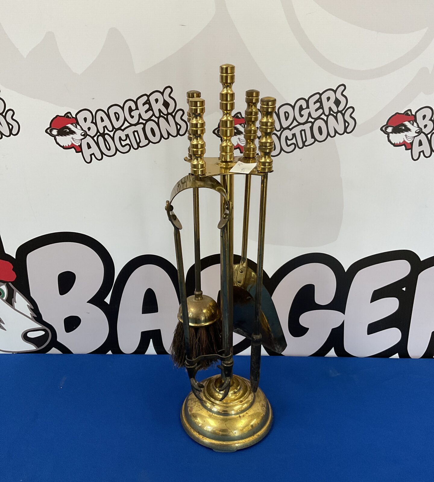 Brass fireplace companion set