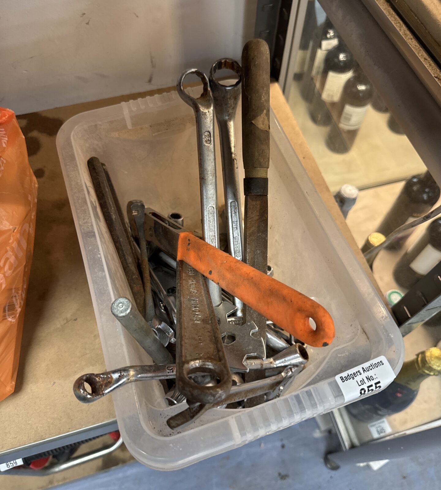 Small tub of assorted tools