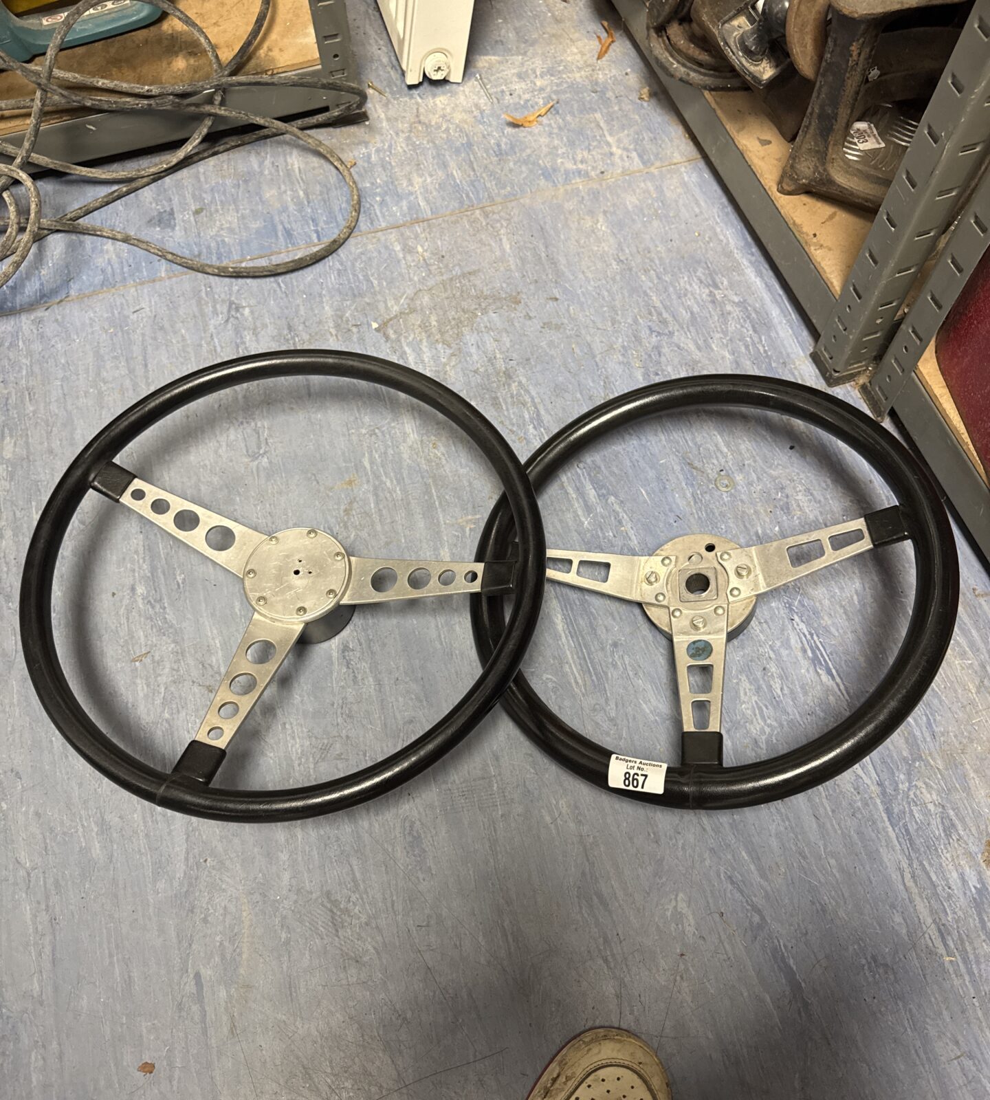 Two vintage MG steering wheels