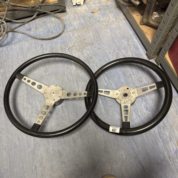 Two vintage MG steering wheels