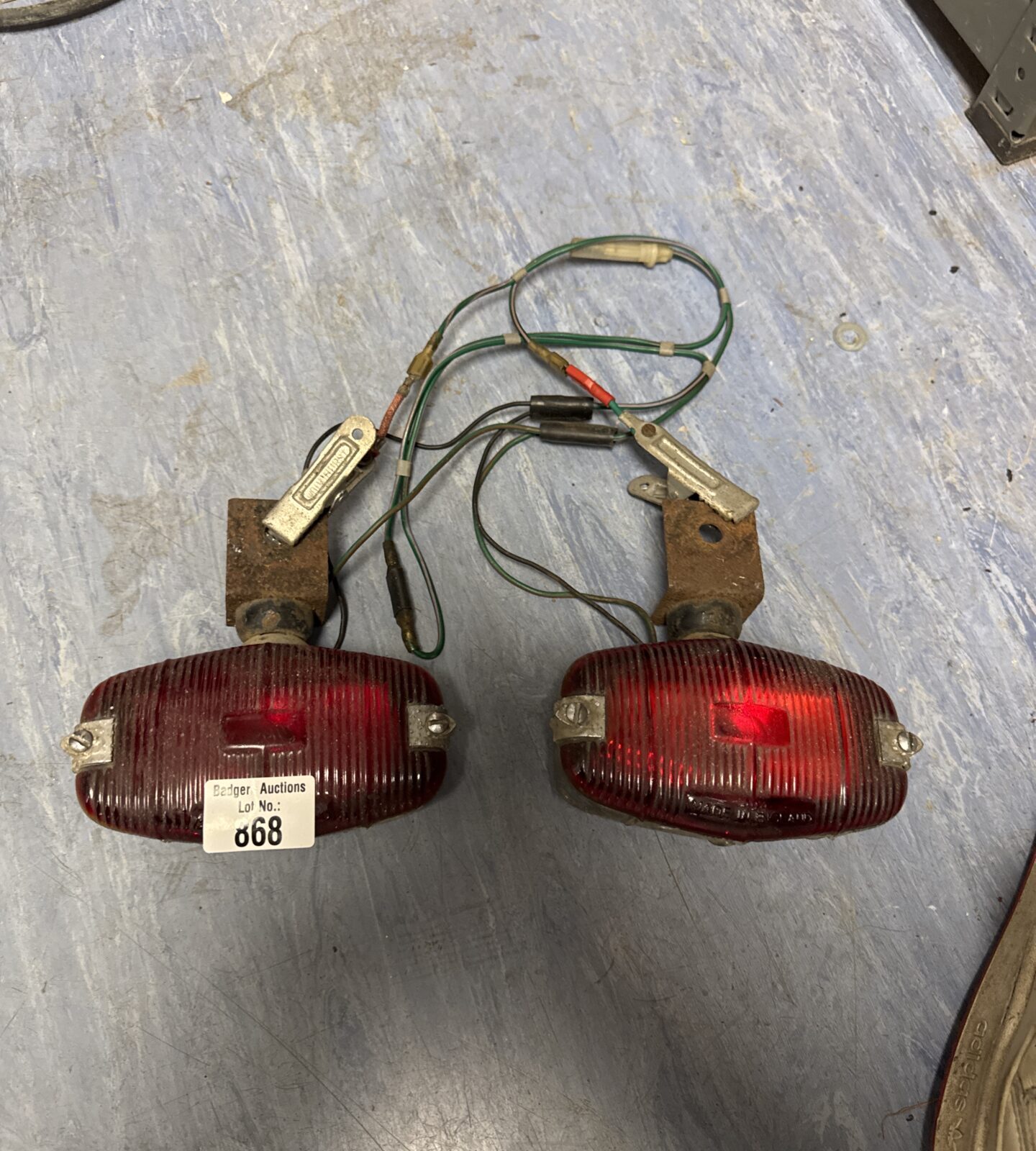 Two vintage vehicle rear lights