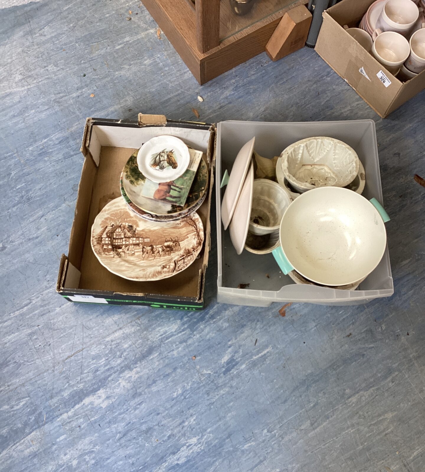 Box of mixed vintage porcelain jelly moulds and plates