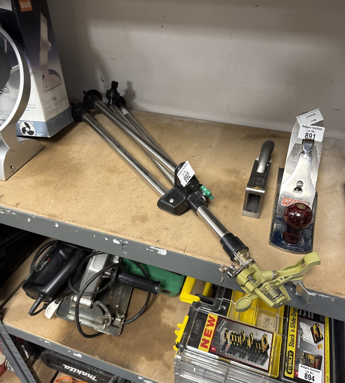 Metal tripod garden sprinkler
