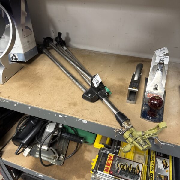 Metal tripod garden sprinkler