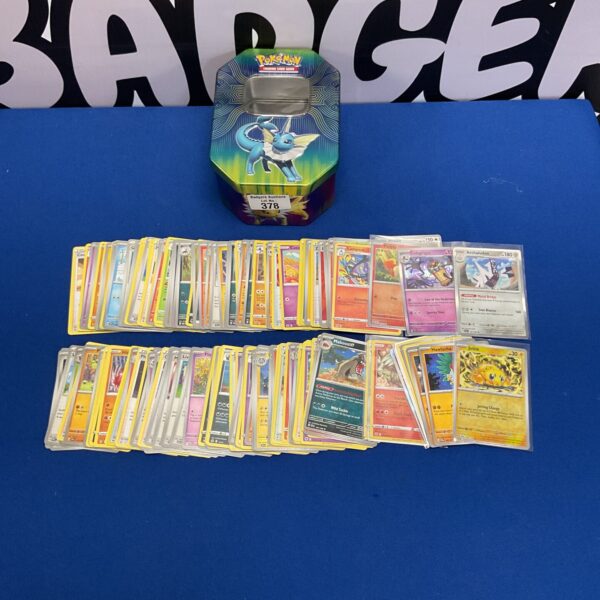 Tin of pokemon cards inc holos
