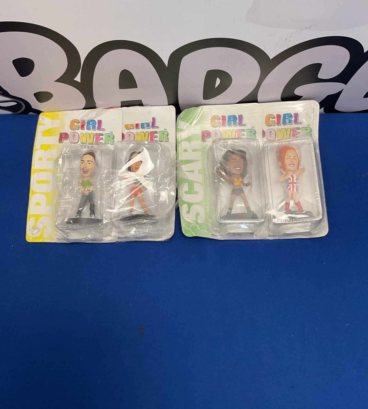 Two girl power figures
