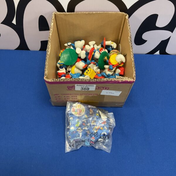Box of retro mcdonalds and payo smurf figures