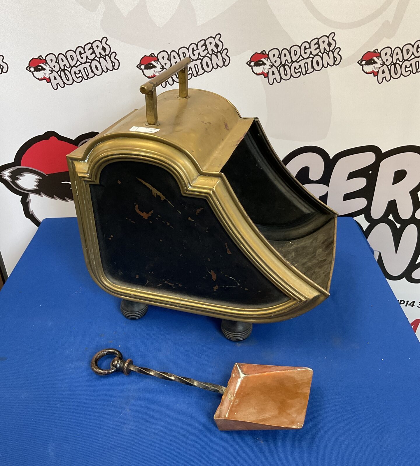 Vintage brass coal scuttle with copper shovel