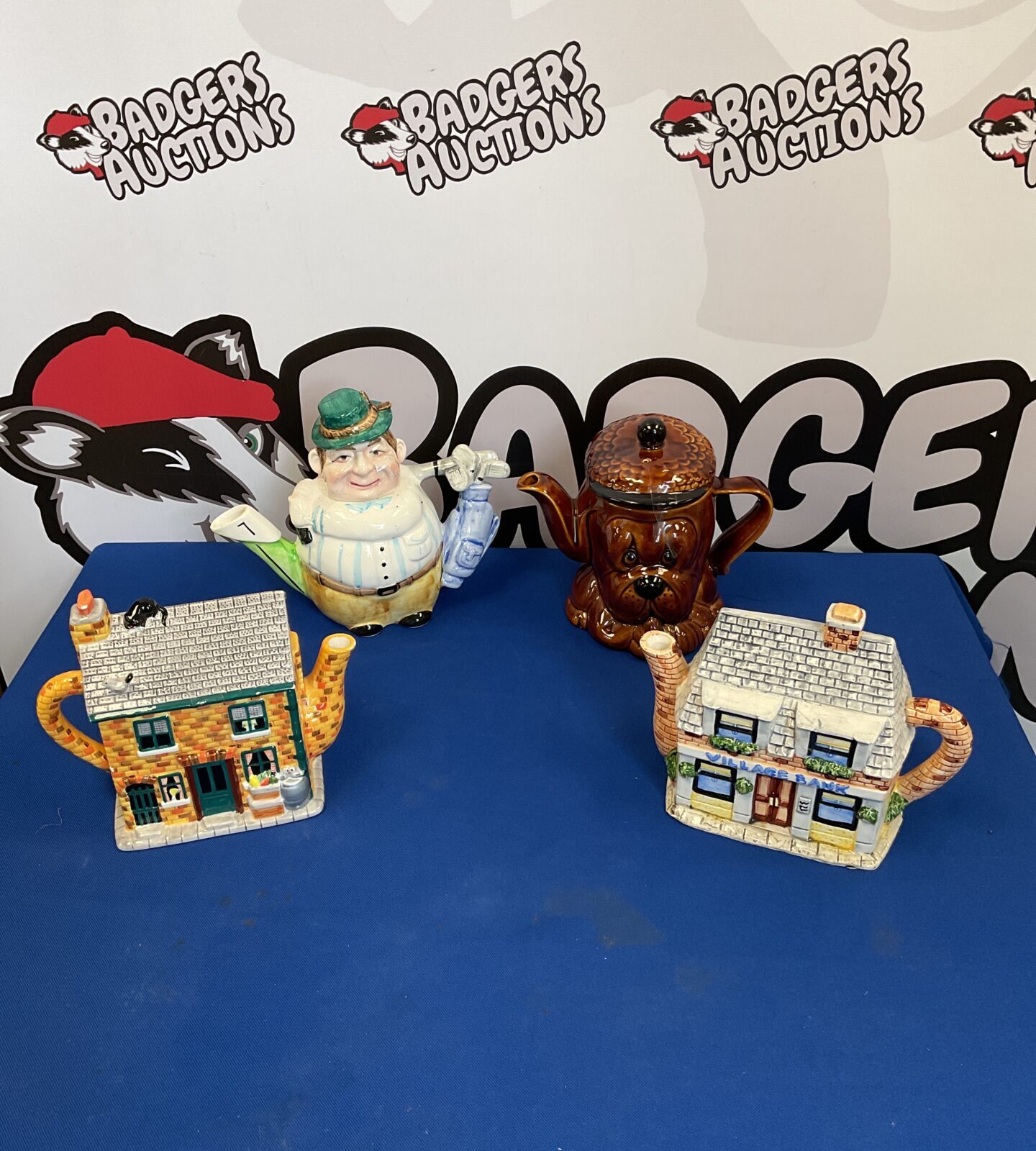Four novelty collectable teapots