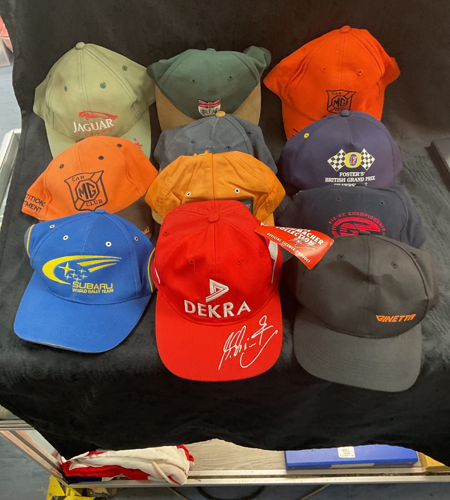 Collection of classic car and racing caps inc Michael Schumacher collection