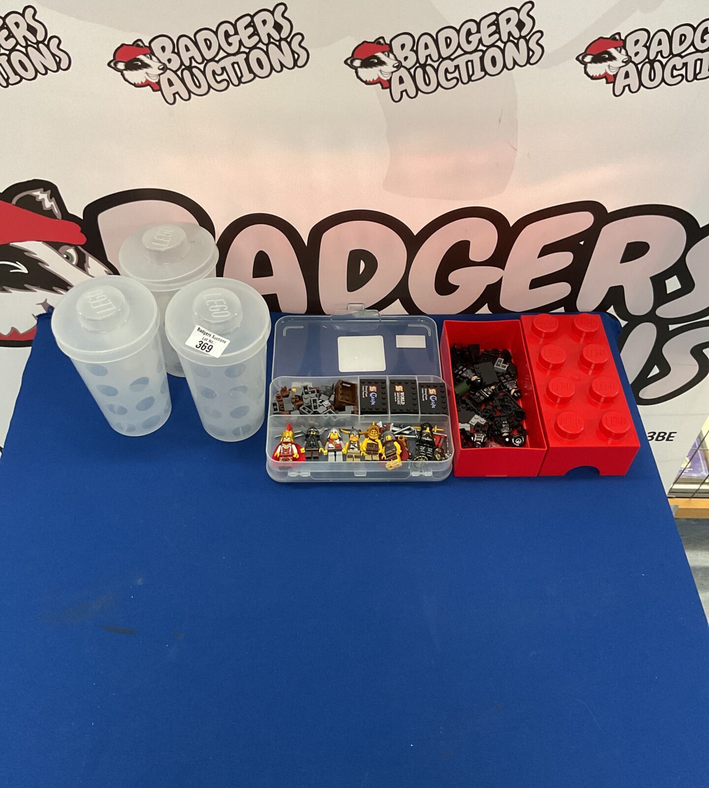 Selection of lego storage boxes with lego style bricks inside