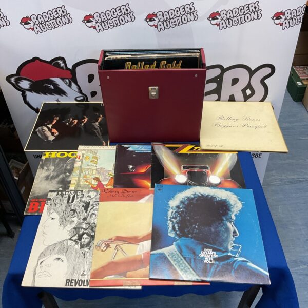 Case of 12” vinyl records including zz top & the rolling stones