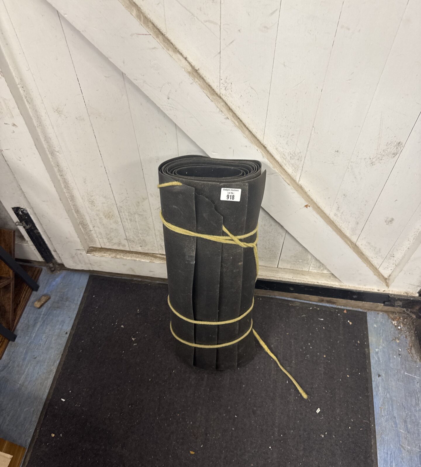 Bundle of rubber backed floor mats
