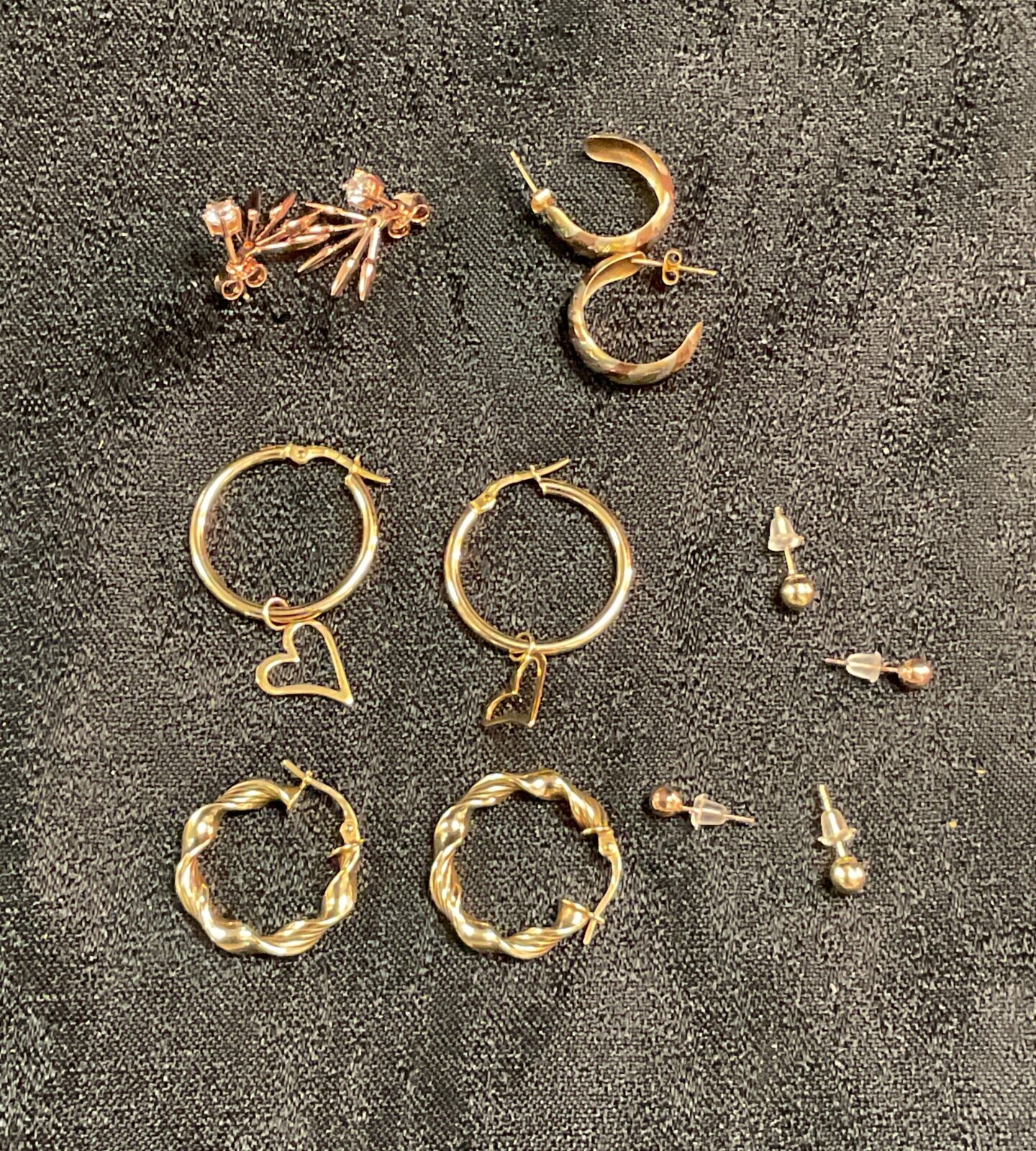 Two pairs 9ct gold hoop earrings  Two pairs 9ct gold stud earrings and two pairs silver earrings 3.8g gold