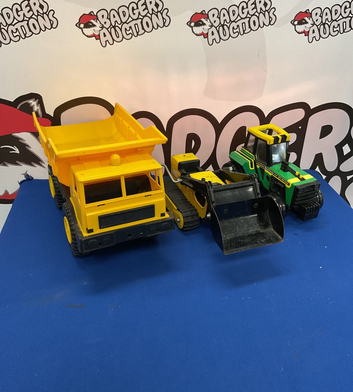 Selection of tractors and trucks inc tonka