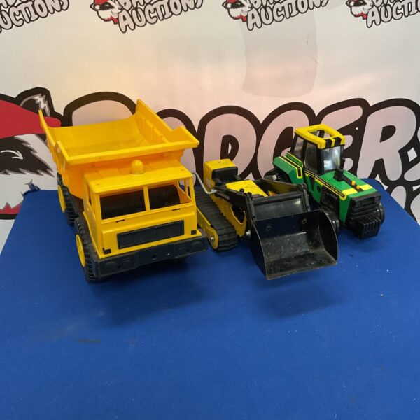 Selection of tractors and trucks inc tonka