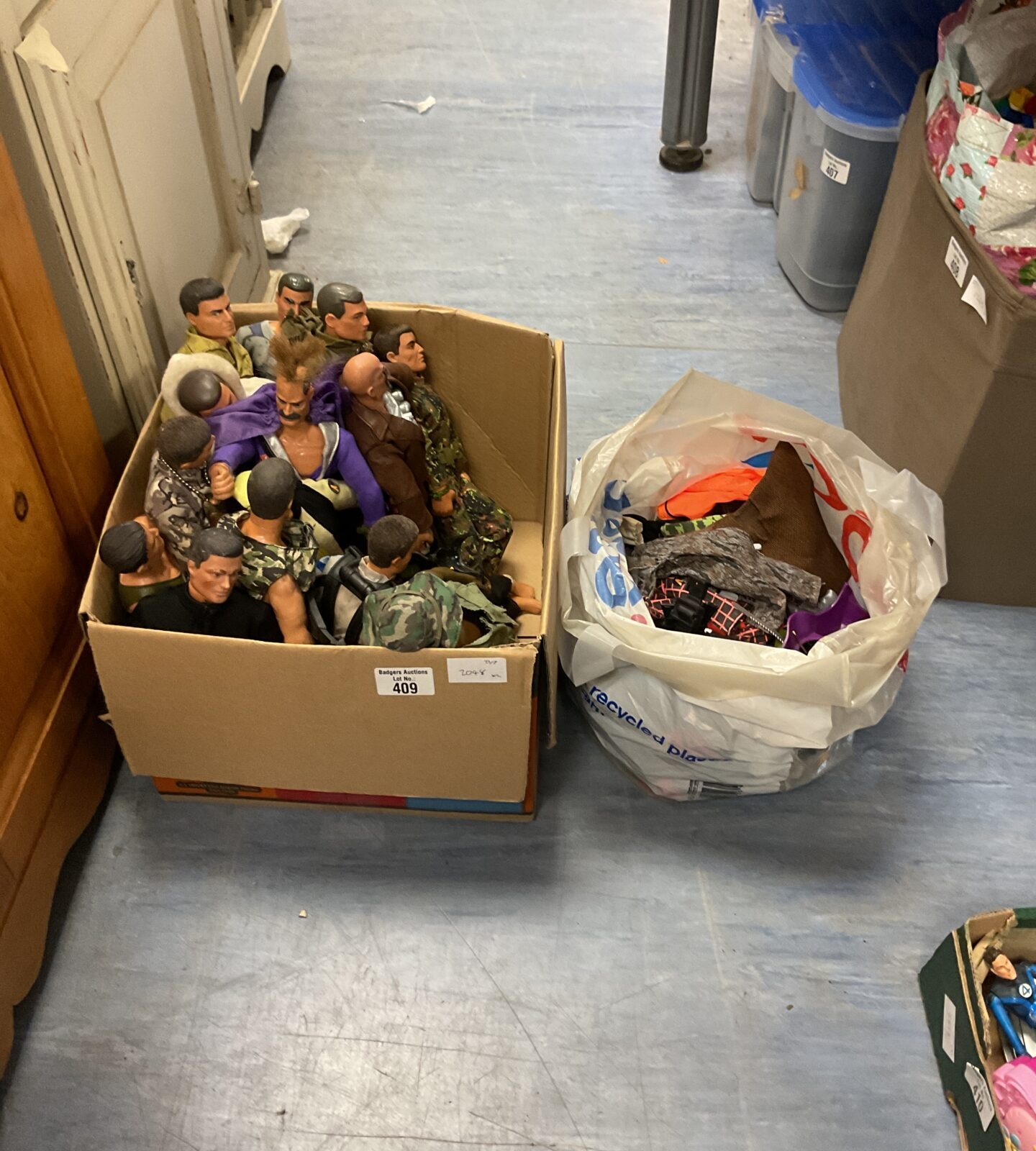 Box of retro hasbro action man figures and accessories .